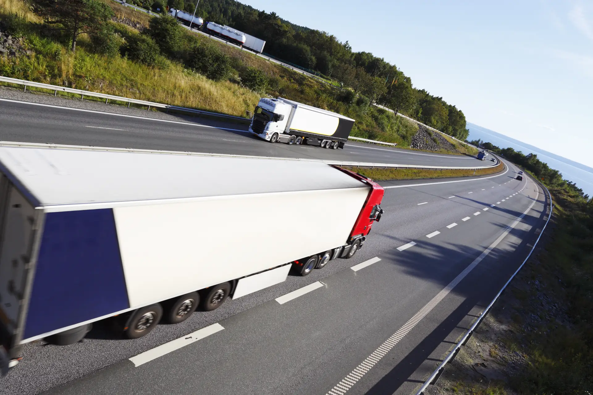 Blue Collar Moving Company trucks on the highway